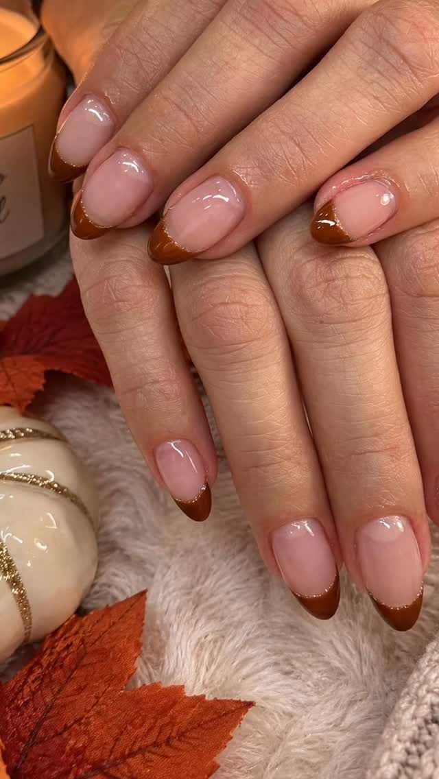 Caramel French tip manicure with fall leaves at Lietynails
